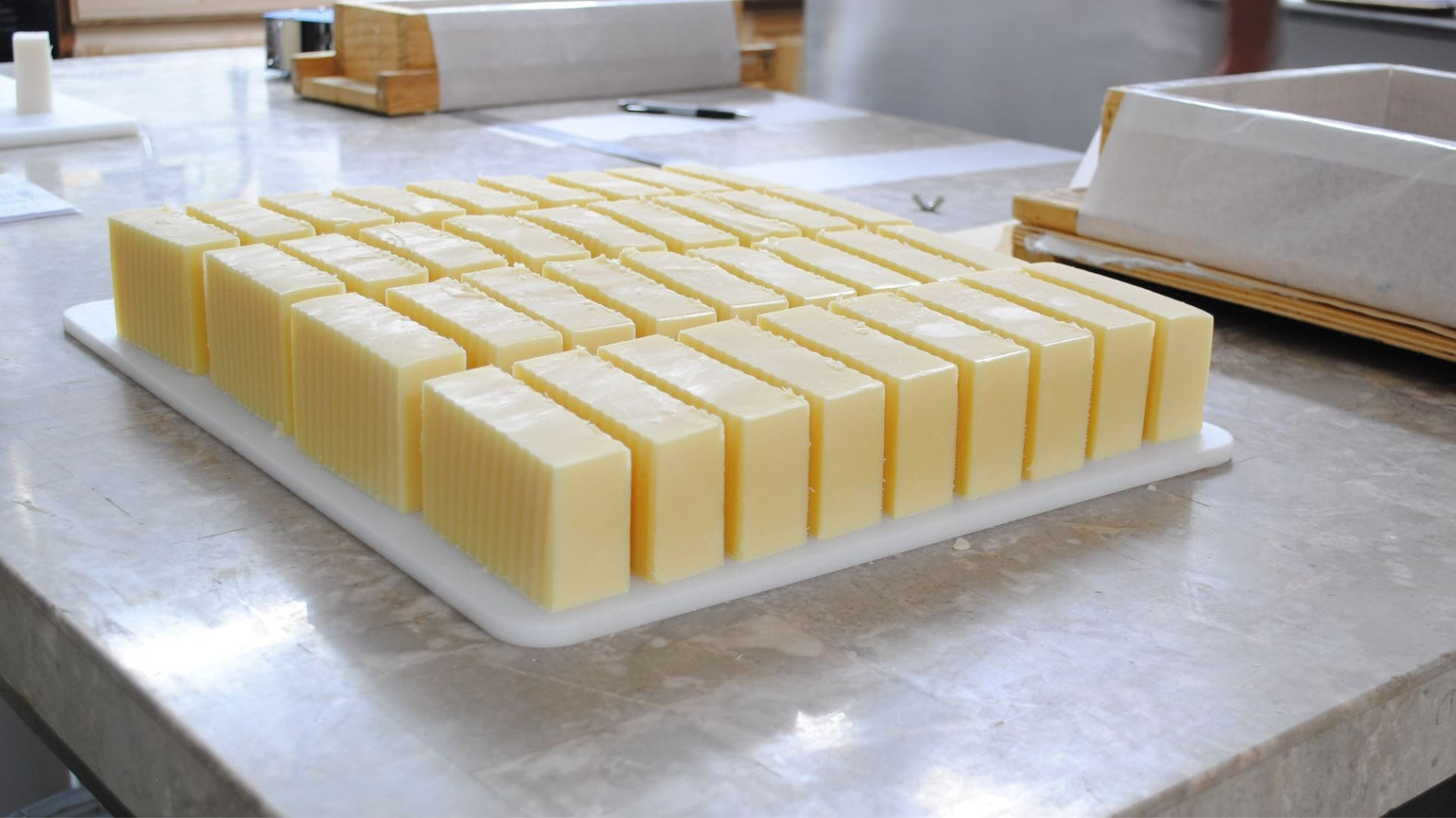 Woman mixing melted glycerin soap base - glycerin soap vs normal soap